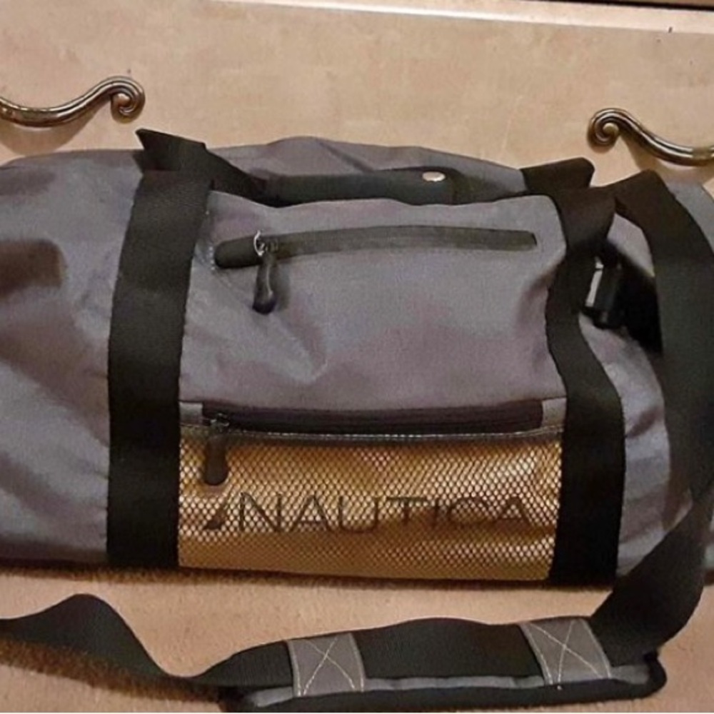Brand New Gray and
Yellow Nautica 28" Duffle Bag With Front
Mesh Compartment
